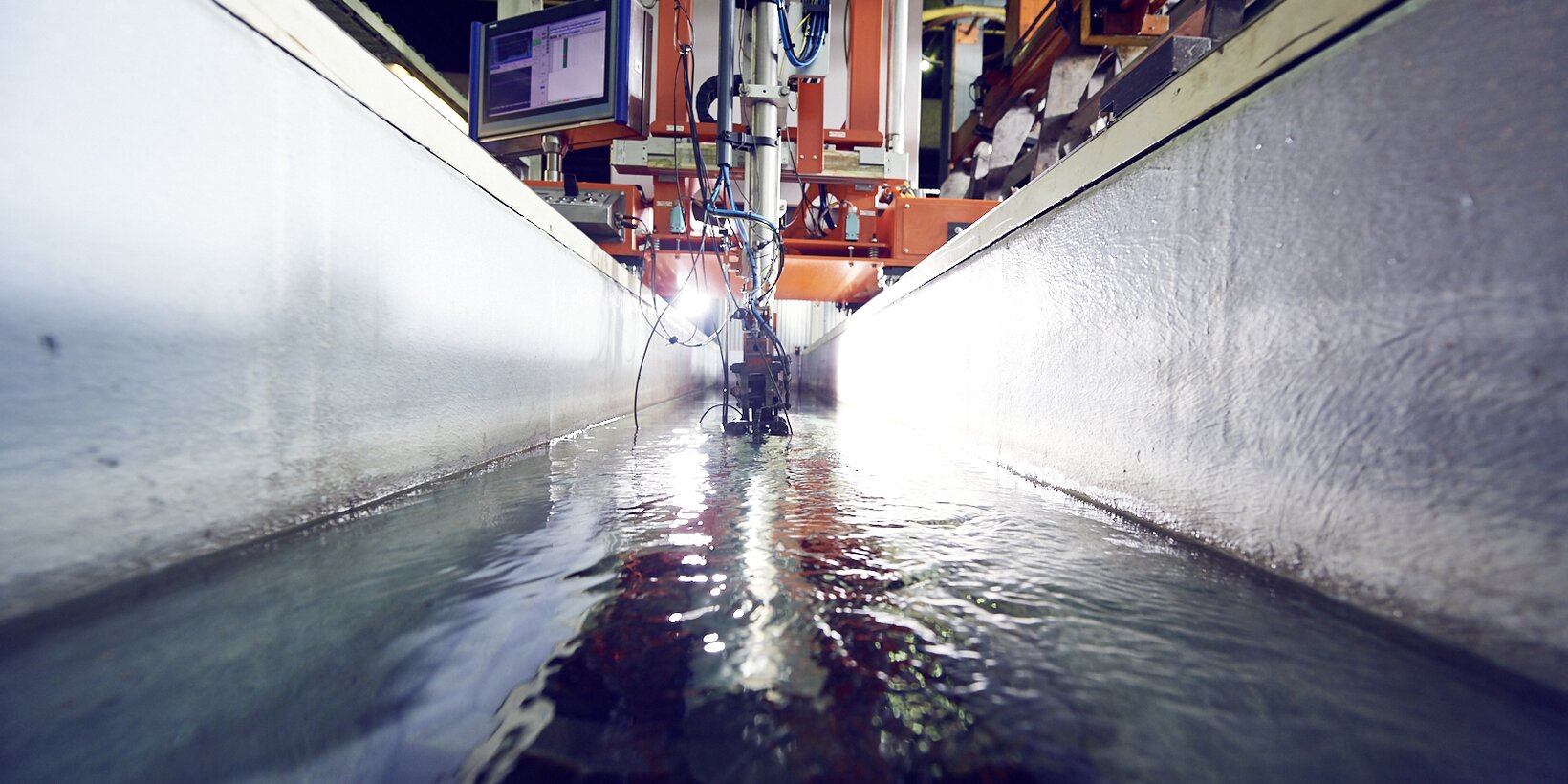 BUG Standort in Bitterfeld - Kühlung des extrudierten Aluminiumprofils mittels Wasser