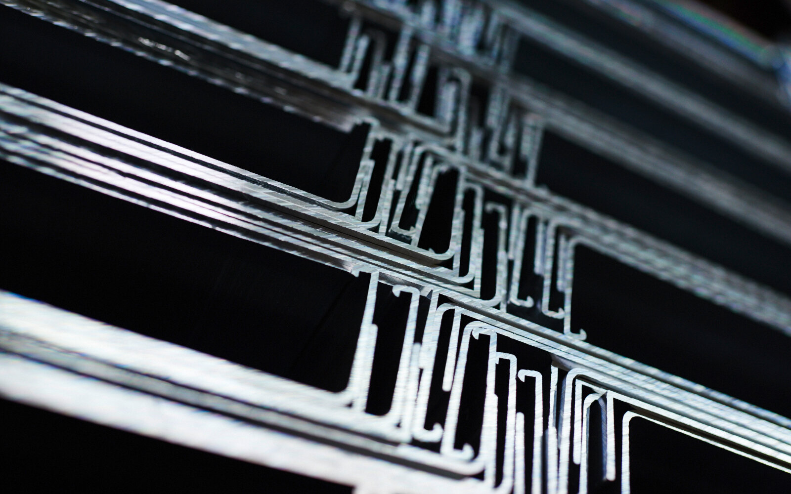 Cross-section of extruded aluminium window sills from Vogt